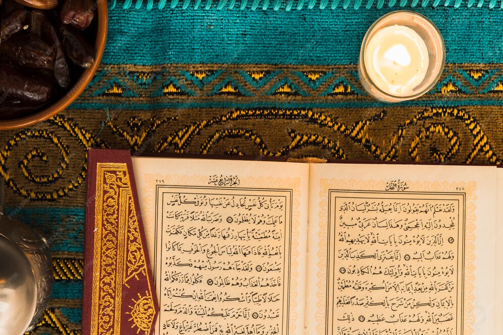 close up candle near quran 23 2147868945