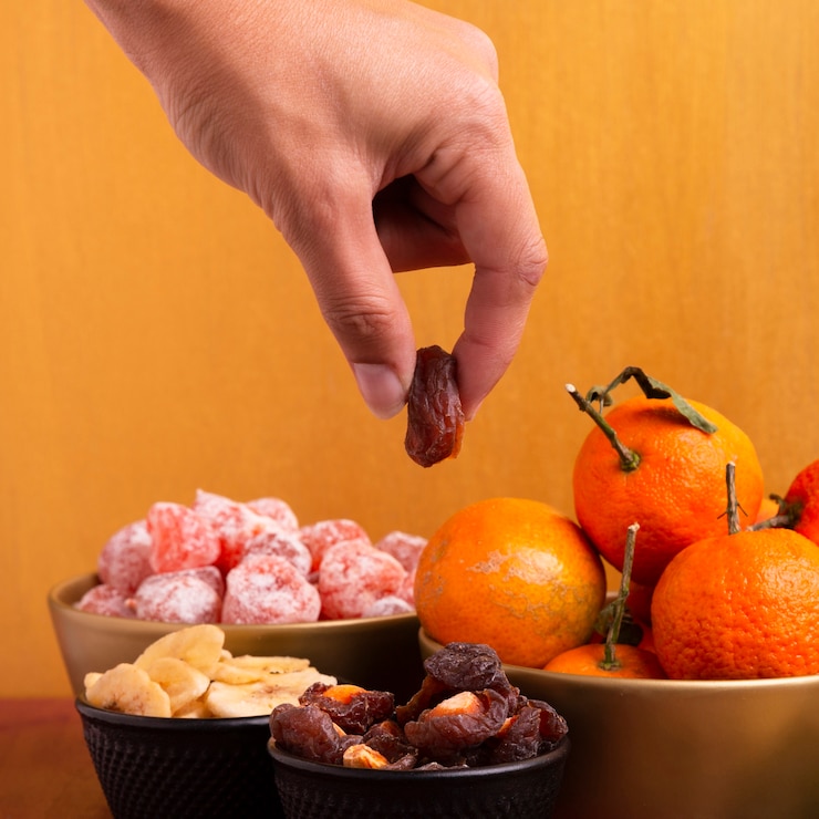 close up hand holding dehydrated fruit chinese new year 23 2148358128