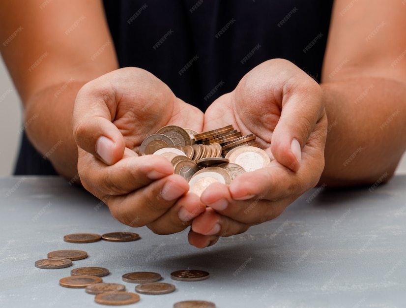 man holding coins palm 176474 7162
