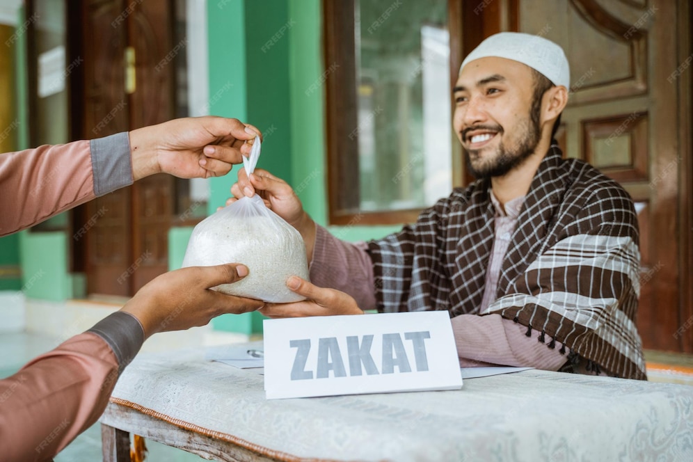 smiling young man giving bag rice mosque 1048944 23984440
