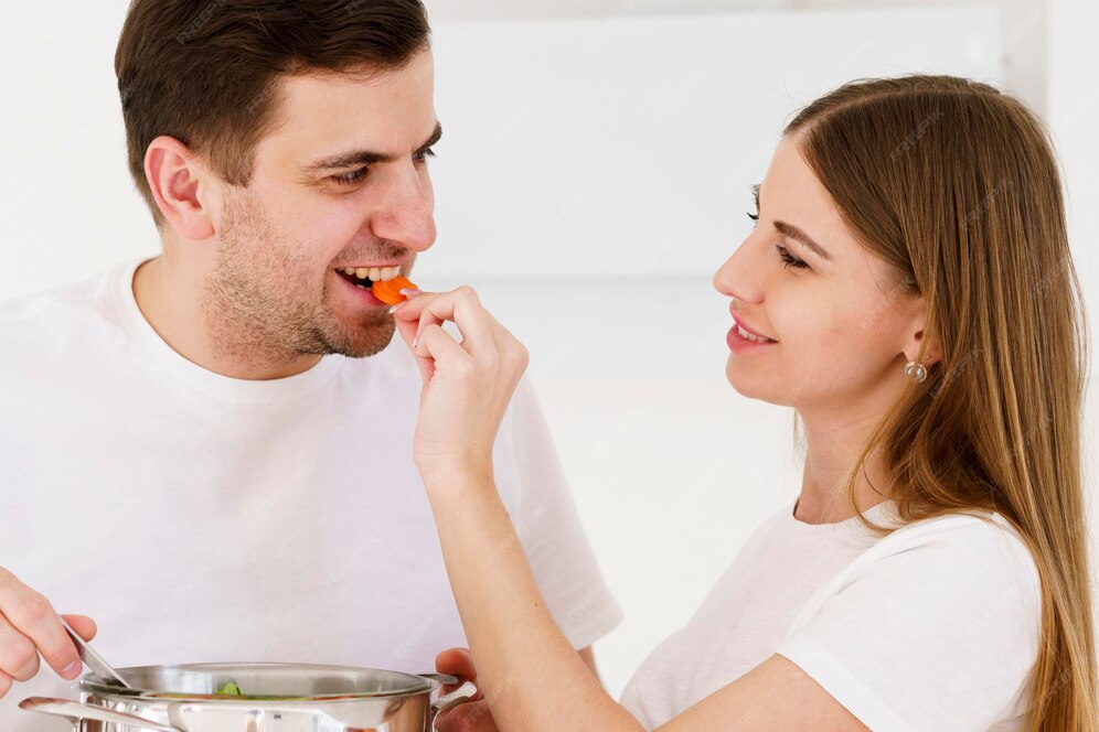 woman feeding man 23 2148535200
